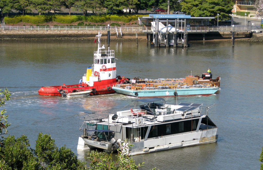 Tugboat with barge J J Topham loaded with fireworks for River Fire 2009