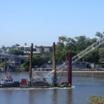 ‘MAY’ and Crane Barge heading upstream ~ 18 Feb 2022 – crane barge later in trouble during the flood